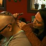 Kirkland artist Sarah Walters creates a henna crown for Mary Glasco at Sankara Imports in Bothell. CATHERINE KRUMMEY/Kirkland Reporter
