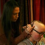 Kirkland artist Sarah Walters creates a henna crown for Mary Glasco at Sankara Imports in Bothell. CATHERINE KRUMMEY/Kirkland Reporter
