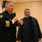 Bellevue Police Department Chief Steven Mylett interacts with Imam Sheikh Fazal of the Islamic Center of Eastside during the Eastside Muslim Safety Forum. ANDY NYSTROM, Redmond Reporter