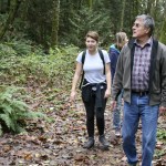 Shelton View Forest Stewardship Association (SVFSA) board members Hillary Sanders (left), Cheryl Stanford and Bob Rorabaugh go on a hike through the forest. CATHERINE KRUMMEY/Bothell Reporter