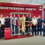Ram Air Gear Dryer Director of Sales David Adams (left) presents a dryer, won in his company&rsquo;s Hometown Heroes contest, to Northshore Fire Department staff in Kenmore. CATHERINE KRUMMEY/Kenmore Reporter