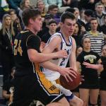 Bothell senior Jake Medjo battles Inglemoor&rsquo;s Stephen Vaught for positioning in the second round of the KingCo tournament on Feb. 11. Medjo was named to the all-conference first-team. JOHN WILLIAM HOWARD/Bothell-Kenmore Reporter