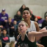 Bothell&rsquo;s Taya Corosdale looks for a rebound over a pair of Skyline defenders during the KingCo conference tournament on Feb. 11. JOHN WILLIAM HOWARD/Bothell-Kenmore Reporter