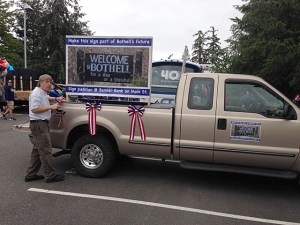 Richard Olson works on a parade float to promote his effort to bring back the &ldquo;Welcome to Bothell for a day or a lifetime&rdquo; sign. Contributed photo