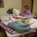 Helga Smith works on a quilt at First Lutheran Church of Bothell on Feb. 2. CATHERINE KRUMMEY/Bothell Reporter