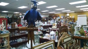 A parrot statue is seen among the merchandise at Not Just Antiques. CATHERINE KRUMMEY / Bothell Reporter