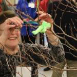 Longtime Kirkland resident and EvergreenHealth Comissioner Rebecca Hirt was one of several to tie a ribbon to a tree as part of a dedication ceremony on March 3 at EvergreenHealth in Kirkland. The new progressive care unit began taking patients on March 6. JOHN WILLIAM HOWARD/Kirkland Reporter