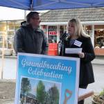 Bothell Mayor Andy Rheaume looks on as State Farm owner Nancy Pipinich speaks during the groundbreaking ceremony for the Main Street Enhancement Project on March 28. CATHERINE KRUMMEY / Bothell Reporter