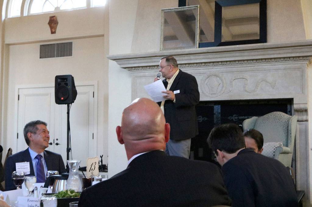 Kenmore Mayor David Baker, who is the current Sound Cities Association (SCA) Board of Directors president, serves as the emcee at a SCA dinner in Kenmore. CATHERINE KRUMMEY / Kenmore Reporter