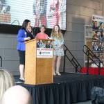 Northshore Schools Foundation Executive Director Carmin Dalziel presents Northshore Junior High School teacher Trudy Swain with the Innovative Educator Award. They are joined on stage by two of Swain&rsquo;s students, Jazmin Valdez and Julia Zahn. CATHERINE KRUMMEY / Bothell Reporter