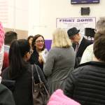 Congresswoman Suzan DelBene (center) speaks with constituents following a town hall event at Lake Washington High School in Kirkland. CATHERINE KRUMMEY/Kirkland Reporter