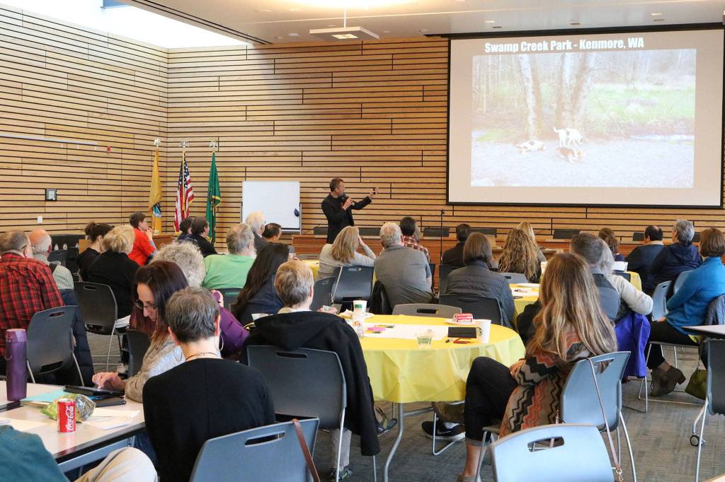Community-building expert Peter Kageyama talks about Kenmore&rsquo;s Swamp Creek Park during a &ldquo;For the Love of Kenmore&rdquo; event at Kenmore City Hall. CATHERINE KRUMMEY / Kenmore Reporter