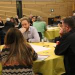 Locals, including Kenmore City Councilmember Nigel Herbig (center), participate in a &ldquo;For the Love of Kenmore&rdquo; event at Kenmore City Hall. CATHERINE KRUMMEY / Kenmore Reporter