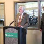 Secretary of Transportation Roger Millar speaks (as Bothell Deputy Mayor Davina Duerr and Gov. Jay Inslee look on) before the Interstate 405 shoulder lane is opened. CATHERINE KRUMMEY / Bothell Reporter