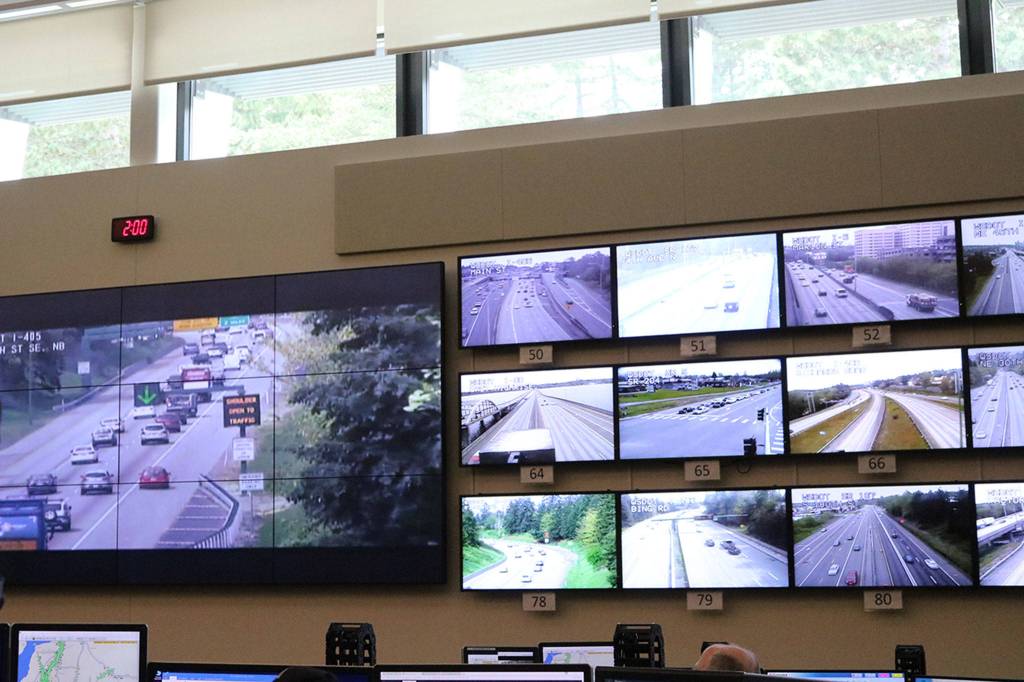 A traffic camera monitor at the Washington State Department of Transportation&rsquo;s traffic management center in Shoreline shows the first car to use the Interstate 405 northbound peak-use shoulder lane in Bothell at 2 p.m. April 24. CATHERINE KRUMMEY / Bothell Reporter