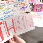 J.T. Fisher has made learning about sharks a personal passion and has dozens of books on the topic. Here he has drawn some types of prehistoric sharks. (Sharon Salyer / The Herald)