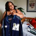 In a spare room at her Lynnwood home, Patricia Faison has kept some things, including photographs and articles about her son, Henry Faison. She even has his high school letterman&rsquo;s jacket. (Dan Bates / The Herald)