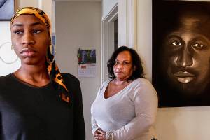 Youngest daughter, Rhonda Faison, 28 (left) and her mom Patricia Faison meet at Patricia&rsquo;s Lynnwood home, March 15 to talk about brother and son, Henry Faison, depicted in photo (top) and painting by Jason Fox (right). (Dan Bates / The Herald)