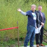 Jim Freese of the Friends of North Creek Forest acknowledges the various individuals and organizations involved in acquiring the forest land as Bothell Mayor Andy Rheaume listens. CATHERINE KRUMMEY / Bothell Reporter