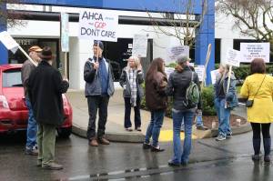 Locals participate in a Indivisible North Seattle-organized rally outside of 1st Congressional District Rep. Suzan DelBene&rsquo;s Bothell office. They wanted to show support for DelBene in her opposition to the Republican-proposed health care reforms in the U.S. House of Representatives. CATHERINE KRUMMEY / Bothell Reporter