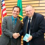 Kenmore Mayor David Baker (right) presents the Complete Streets Award to traffic engineer Brett Schock at the May 8 City Council meeting. Courtesy photo