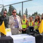 Bothell Mayor Andy Rheaume and Northshore School District (NSD) Superintendent Michelle Reid celebrate the installation of pedestrian flags at a variety of intersections near NSD schools alongside Frank Love Elementary School students. CATHERINE KRUMMEY / Bothell Reporter