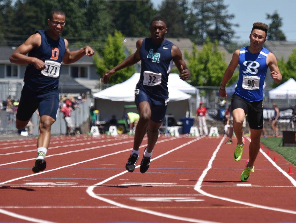 Bothell&rsquo;s Kevin Liu, right, rips through the 100 meters. Courtesy of Greg Nelson