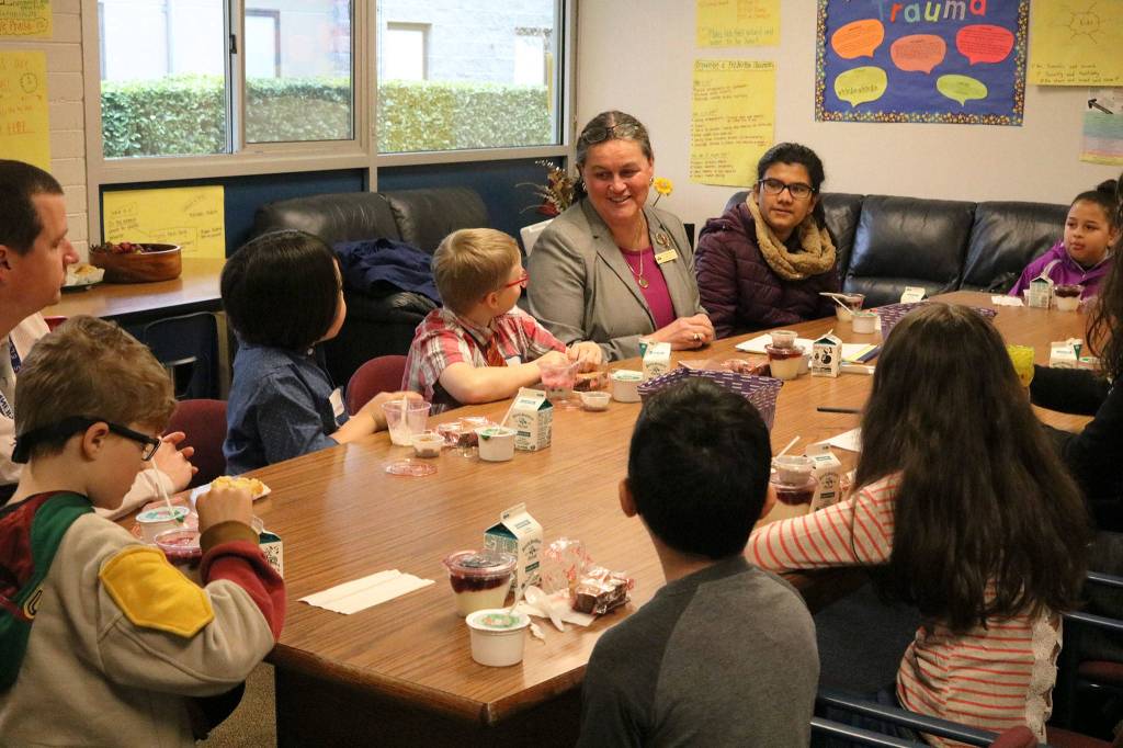 Northshore School District Superintendent Dr. Michelle Reid (center) visits with students and administrators at Crystal Springs Elementary School in Bothell. CATHERINE KRUMMEY, Bothell-Kenmore Reporter