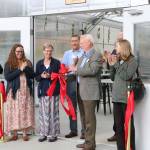 Bastyr University and other local officials participate in a ribbon-cutting ceremony for the college&rsquo;s new greenhouse. CATHERINE KRUMMEY / Bothell-Kenmore Reporter