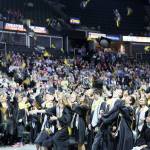 Inglemoor High School graduates toss their caps in the air to celebrate the end of their high school careers. Courtesy of Northshore School District