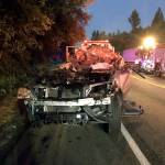 The wreckage of a vehicle that struck a parked semi trailer on Alderwood Mall Parkway early Wednesday. At least three people were killed. Courtesy of Snohomish County Sheriff&rsquo;s Office