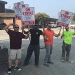 Teamsters Local 174 members, from left, Rob McKnight, Mark Shipley, Chris Rush and Danny Resnick are on strike at the CalPortland location in Kenmore. Courtesy of Teamsters Local 174