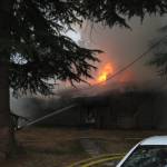 A house fire in the 21200 block of 1st Avenue West in unincorporated Snohomish County north of Bothell injured two people and killed the family dog Sunday morning. Snohomish County Fire District 1/courtesy photo