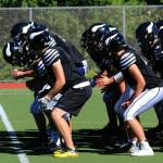 Steve Hannan faces some of his Inglemoor High players before a recent practice. Andy Nystrom, Bothell/Kenmore Reporter