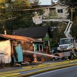 Fire crews from multiple jurisdictions work to put out a fire at the Butcher Shop Cafe in Kenmore. The fire was put out within 20 minutes. Photos Courtesy of Amber Swanson