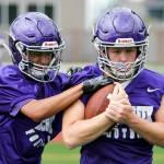 Sohin Mehta, left, works to free the ball from Kristian Brusa during a recent practice at North Creek High in Bothell. The new school will field its first sports teams this season. Kevin Clark / The Herald