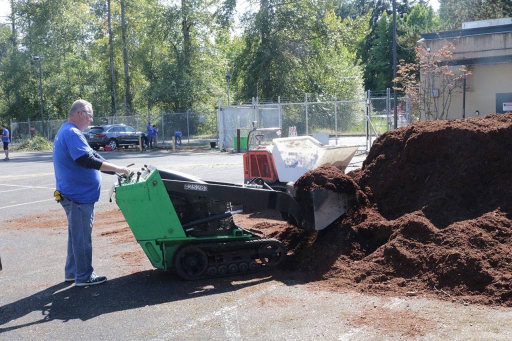 Microsoft workers spruce up Mary’s Place in Kenmore