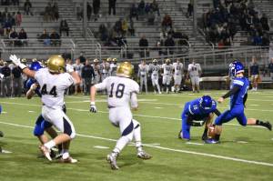 Bothell&rsquo;s Kyler Parris kicks the game-winning field goal against Mullen last night. Courtesy of Greg Nelson