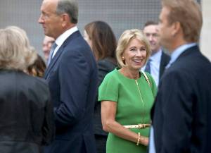 U.S. Education Secretary Betsy DeVos arrives at the dedication ceremony of Michigan State University&rsquo;s new Grand Rapids Medical Research Center on Wednesday in Grand Rapids, Michigan. (Cory Morse /The Grand Rapids Press via AP)