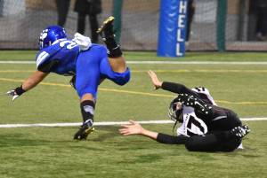 Bothell&rsquo;s Christian Galvan dives into the end zone to complete his 98-yard kickoff return to begin last Saturday&rsquo;s game. Courtesy of Greg Nelson