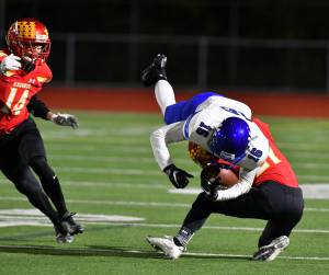 Bothell&rsquo;s Ryder Locknane collides with a Newport player in Friday night&rsquo;s game. Courtesy of Greg Nelson