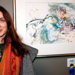 Antoaneta Georgieva poses with her first-prize painting, Dreaming. Courtesy of the Northwest Watercolor Society.