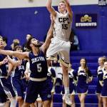 Cedar Park Christian senior George Reidy shoots over a Sultan opponent this season. Courtesy of Bernie Derke