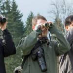 Andy McCormick, Seth Truscott and Amit Kulkarni watch birds at an Eastside Audubon event in March 2013. Mick Thompson, Eastside Audubon