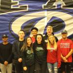 Eight Bothell High seniors committed via letters of intent to play sports at their chosen colleges on Feb. 7. Pictured back row, left to right: Football coach Tom Bainter; Eyakem Asmelash (football) Culver Stockton College; Drew Nicholson (football) Simon Fraser; DaVicious Wilson (football) Central Washington; Hunter Smith (football) Idaho State; Jaelen Percival (football) Central Washington; and girls soccer coach Shaun Warner. Front row, left to right: Jacy Delgado (soccer) Shoreline; Emily Heffernan (soccer) Shoreline; Sydney Nolan (soccer) University of Indianapolis.