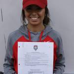 Kylie Russell signs a letter of intent to play for the University of New Mexicos womens soccer team next fall. Kailan Manandic, Bothell/Kenmore Reporter