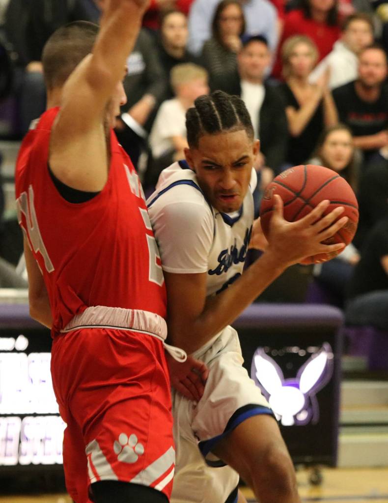 Bothells DaVicious Wilson plows through a Mount Si defender. Andy Nystrom, Reporter