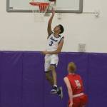 Bothells Spencer Wright goes up for two. Andy Nystrom, Reporter