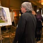 A luncheon attendee views information on a Friends of Youth foster home. Photo courtesy of Friends of Youth