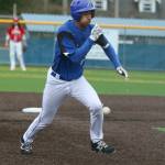 Bothells Jake Peoples heads for third against Newport on March 28. Andy Nystrom/staff photo